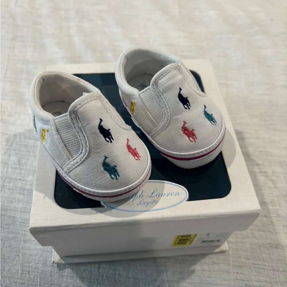 Polo by Ralph Lauren White Canvas Slip-On Baby Shoes with Multicolor Polo Logos
